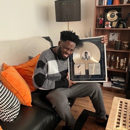 The Multitalented British-Ghanaian record producer just received his first plaque courtesy of MADE IN LAGOS (MIL) Album. 