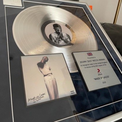 The Multitalented British-Ghanaian record producer just received his first plaque courtesy of MADE IN LAGOS (MIL) Album. 